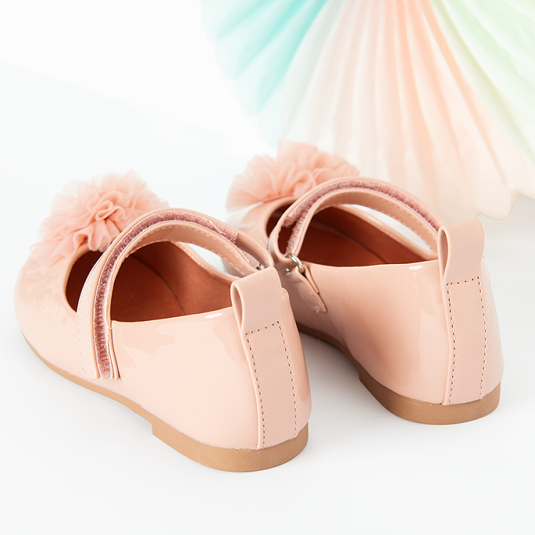 Pink ballerinas with pom pom