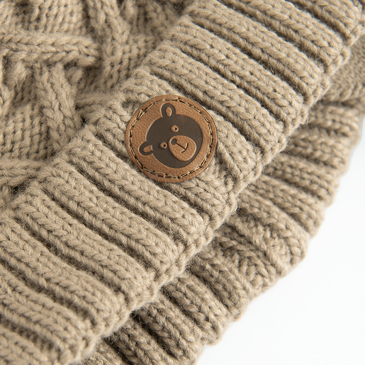 Beige winter earflap hat