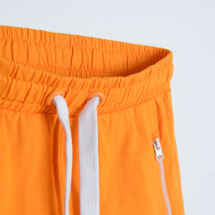 Orange shorts with adjustable waist and pockets