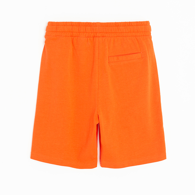 Orange bermuda shorts with cord on the waist