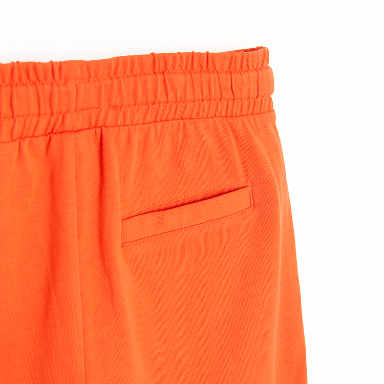 Orange bermuda shorts with cord on the waist