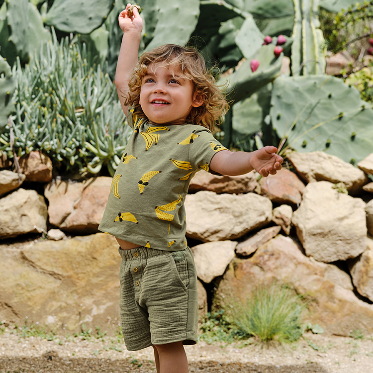 Khaki shorts with buttons in the middle