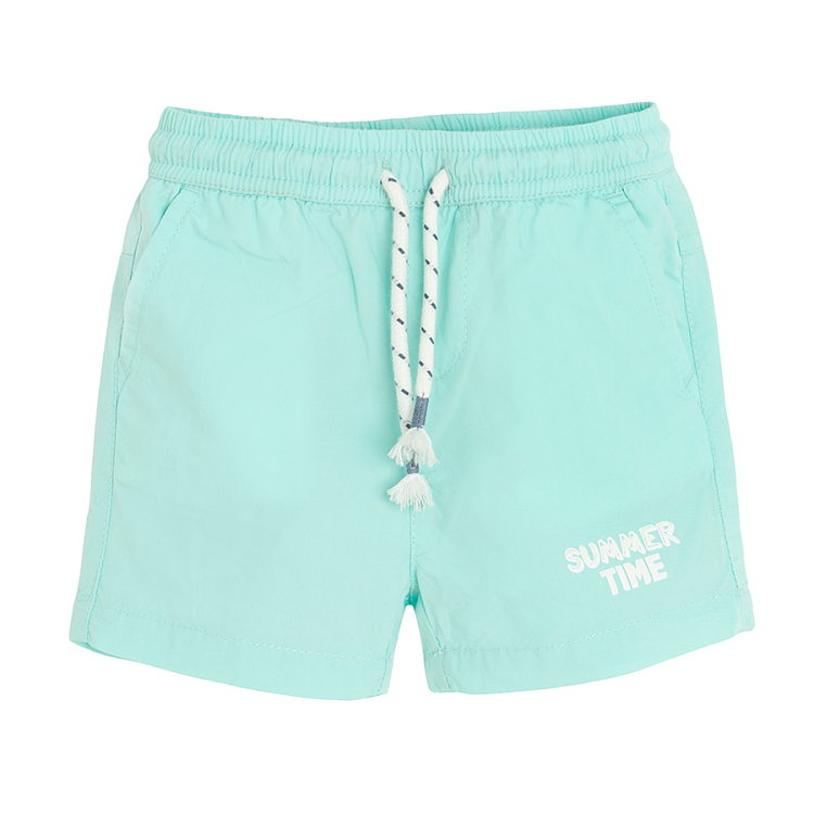 Light turquoise shorts with cord on the waist