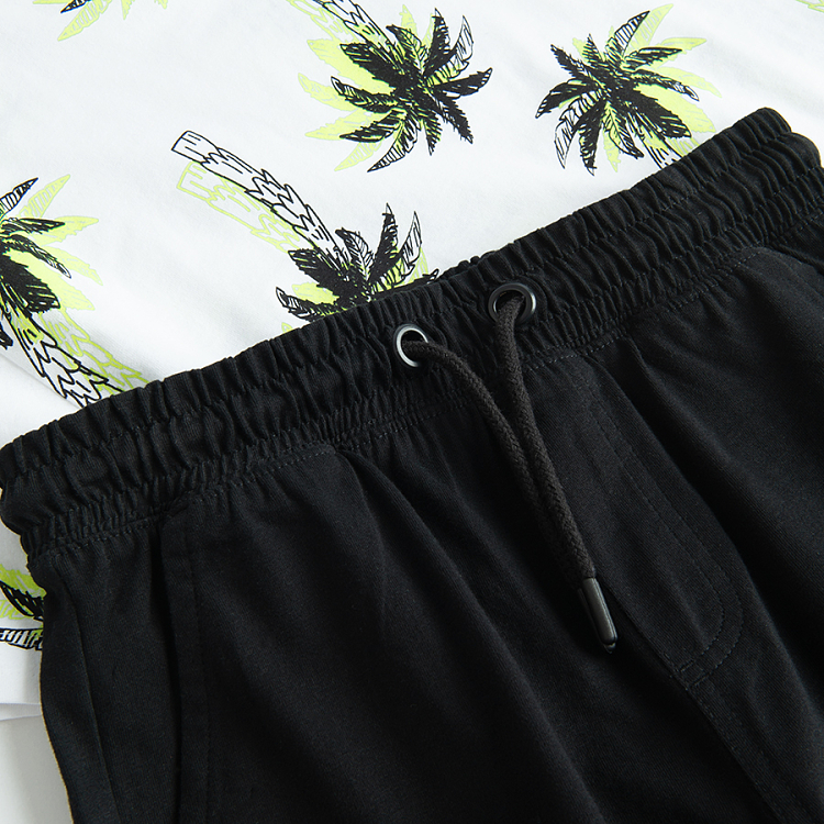 White T-shirt with palm trees and black shorts