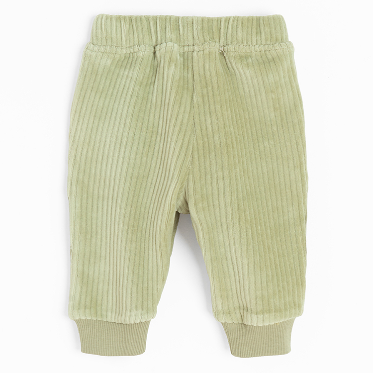 Green jogging pants with side external pockets