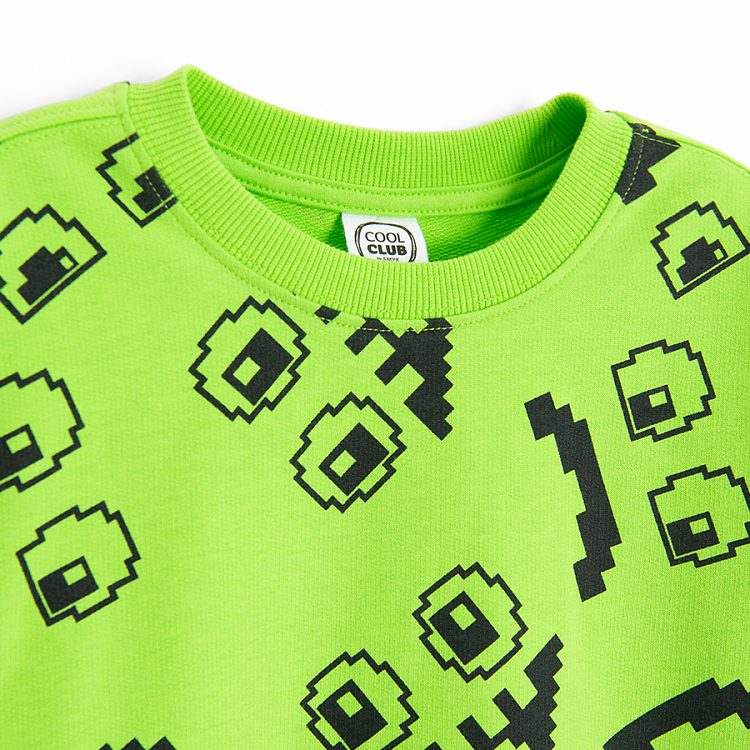 Lime sweatshirt with funny faces print