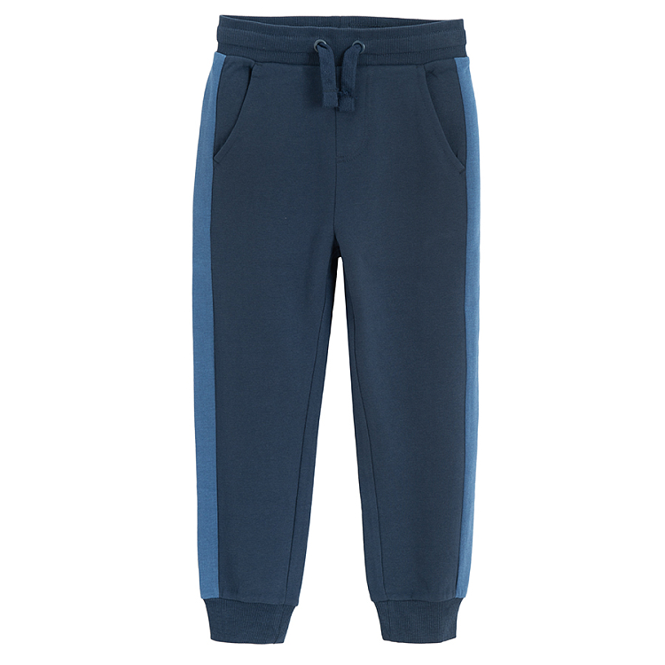 Blue sweatpants with stripe on the side and cord