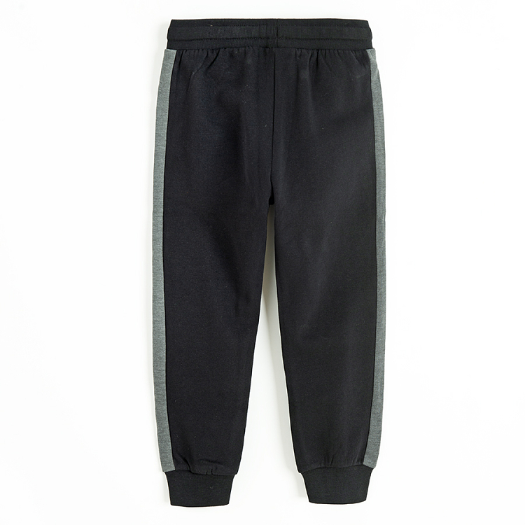 Black sweatpants with grey strip on the side