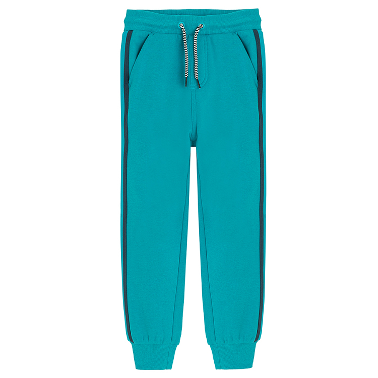 Light blue jogging pants with side stripes