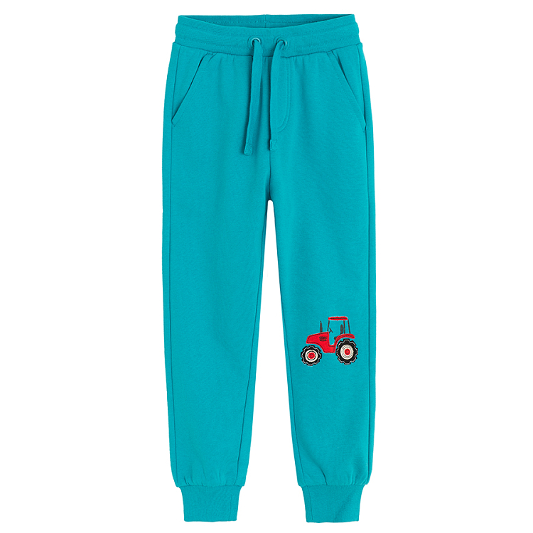 Light blue jogging pants with tractor print