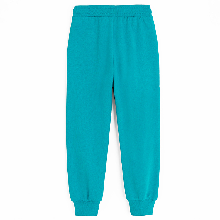 Light blue jogging pants with tractor print