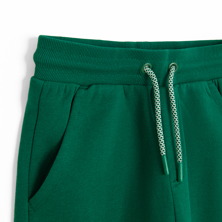 Green jogging pants