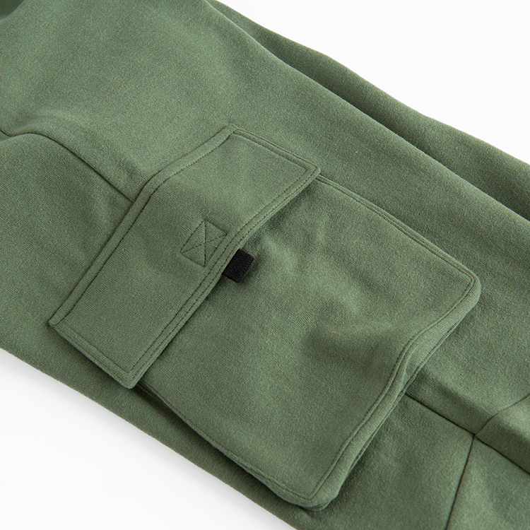 Khaki jogging pants with external side pockets