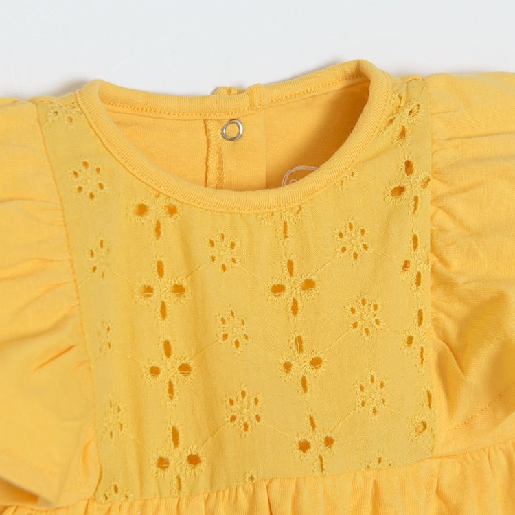 Yellow sleeveless dress/bodysuit with ruffle on the shoulder and embroidered top