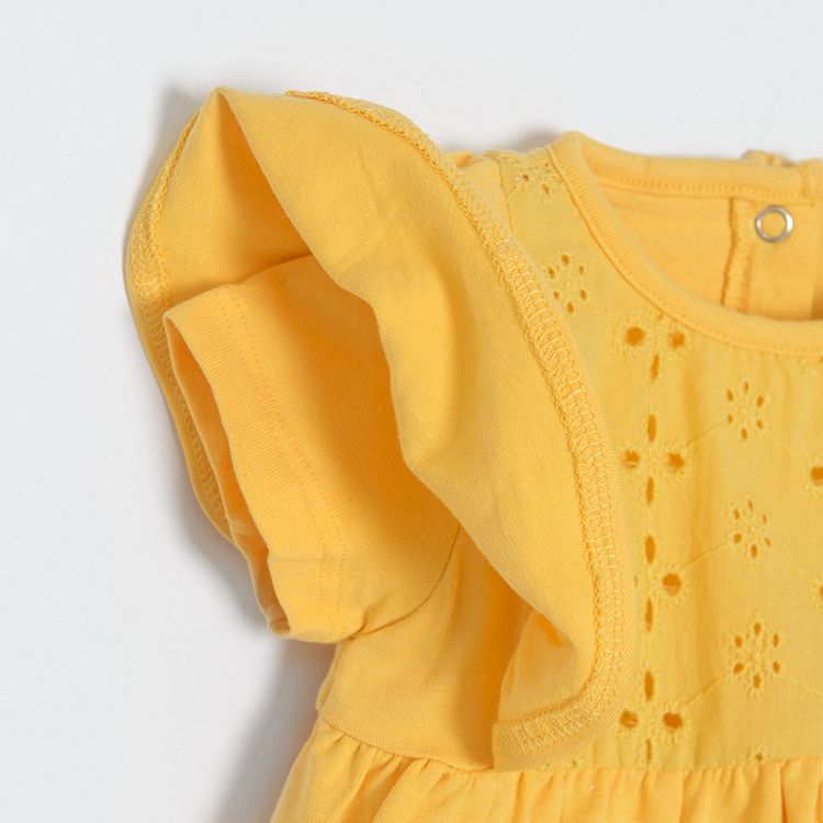 Yellow sleeveless dress/bodysuit with ruffle on the shoulder and embroidered top