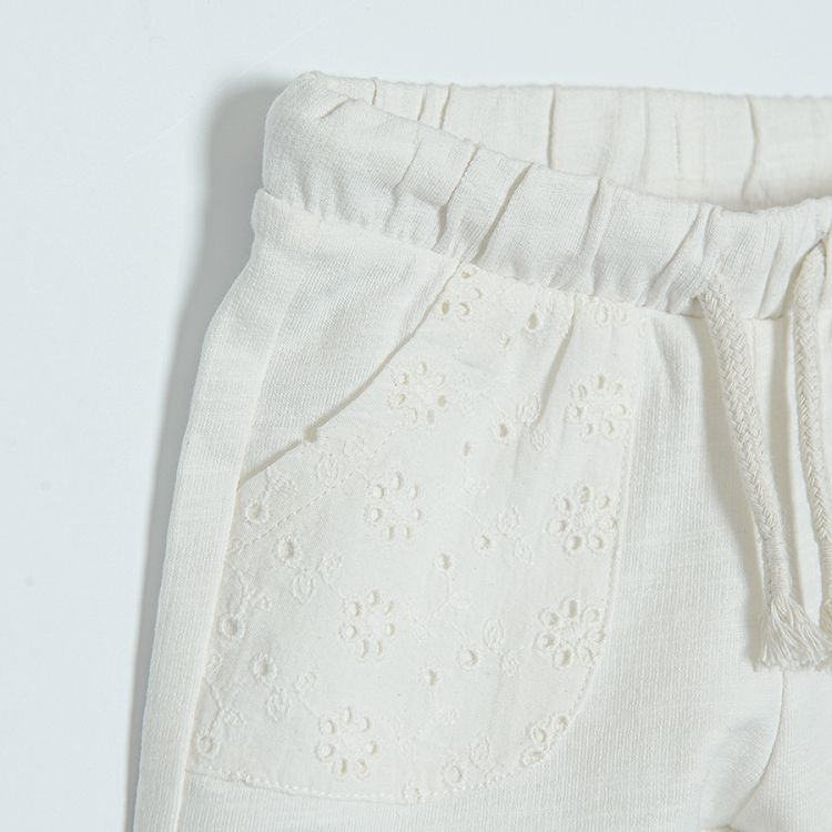 Cream shorts with adjustable waist