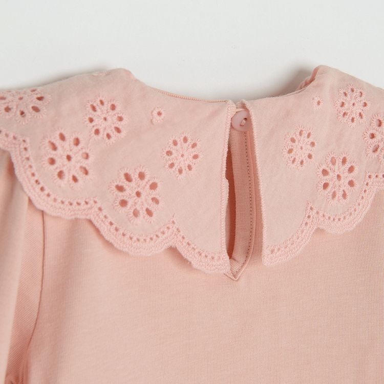 Light pink bodysuit with embroidered ruffle on the neckline