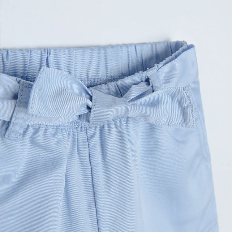 Blue shorts with elastic waist that ties in a knot