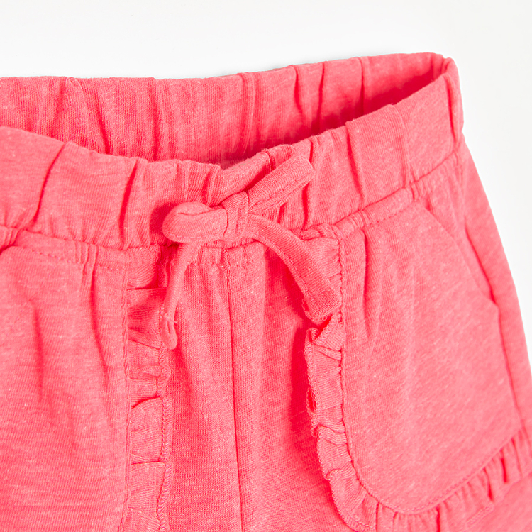 Fucshia shorts with ruffles on side pockets