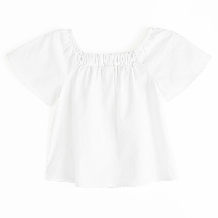 White shirt with ruffle sleeves