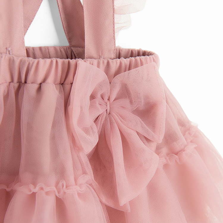 Pink dungaree skirt