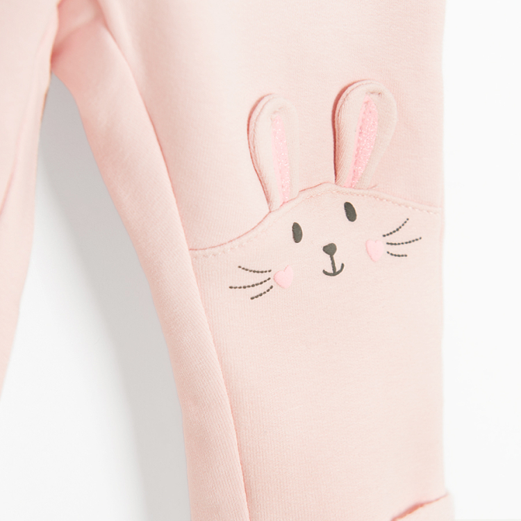 Pink leggings with bunny patter on the bottom