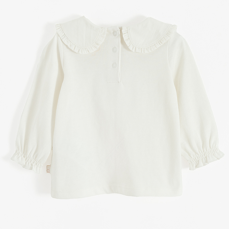 White long sleeve blouse with round collar and elastic around wrists