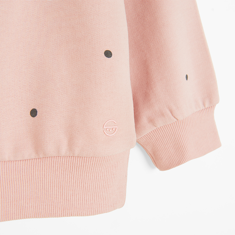 Pink sweatshirt with black dots