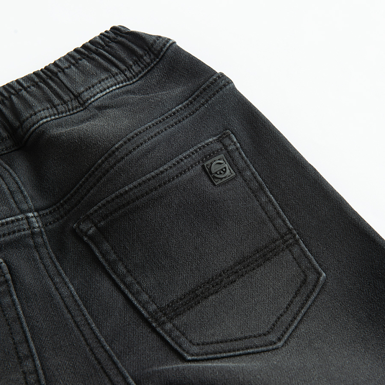 Black denim trousers