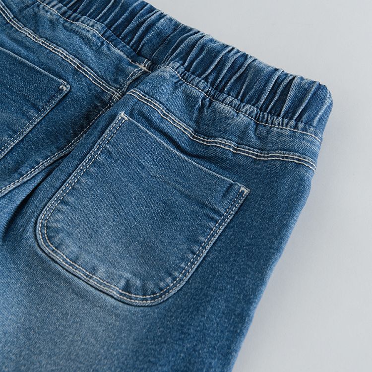 Denim trousers with adjustable waist