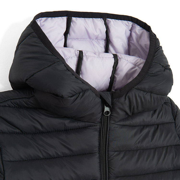 Black zip through jacket with purple lining on the hood