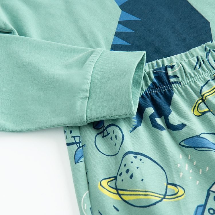 Light blue long sleeve and pants pyjamas with dinosaur print