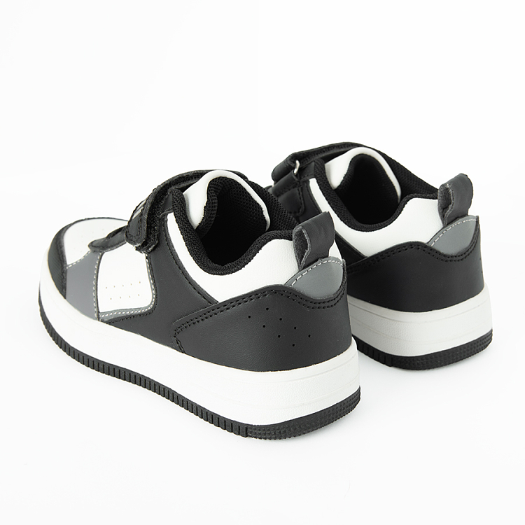 Black and white low trainers