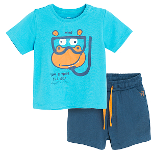 Set light blue t-shirt with hippo print and blue shorts