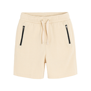 Beige shorts with cord on waist