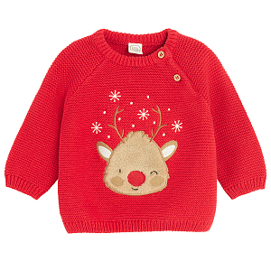 Red sweater with raindeer print