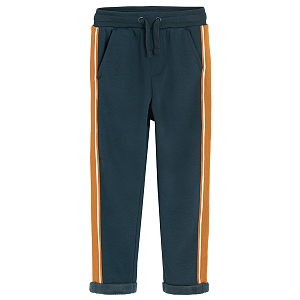 Blue jogging pants with side stripes