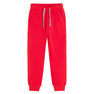 Red jogging pants