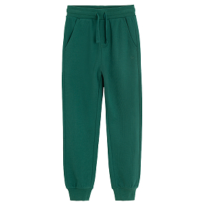 Green jogging pants