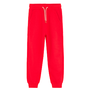 Red jogging pants