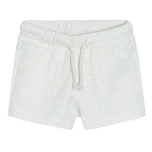 Cream shorts with adjustable waist
