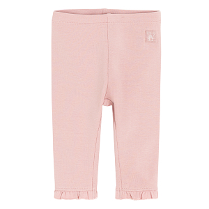 Pink leggings with ruffles at the bottom