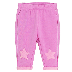 Purple jogging pants with stars print