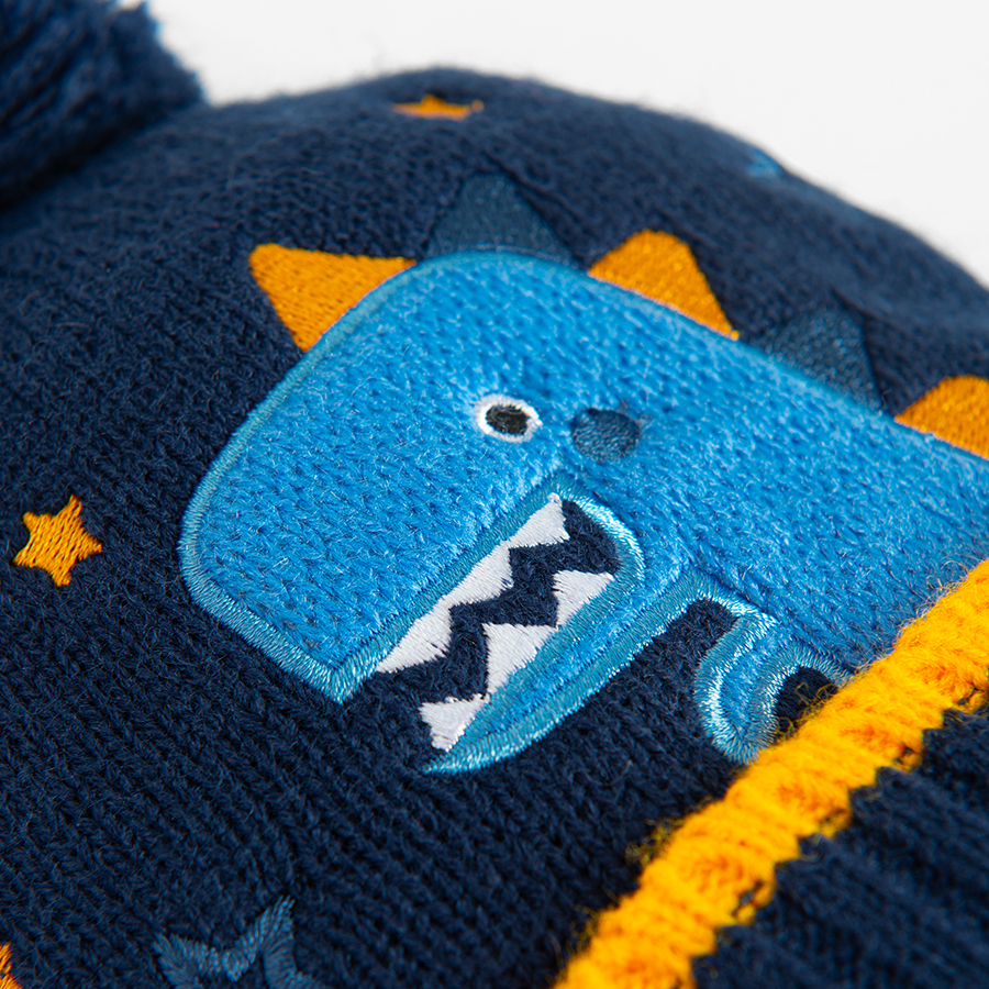 Blue winter earflap har with dinosaur print