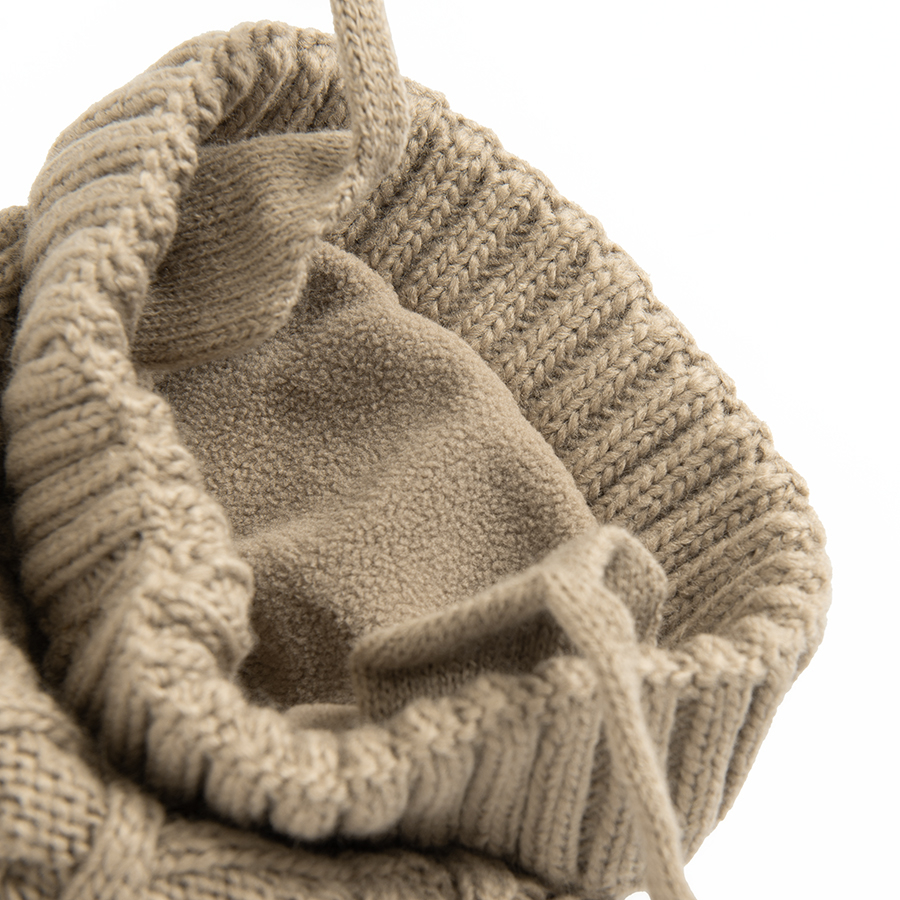 Beige winter earflap hat