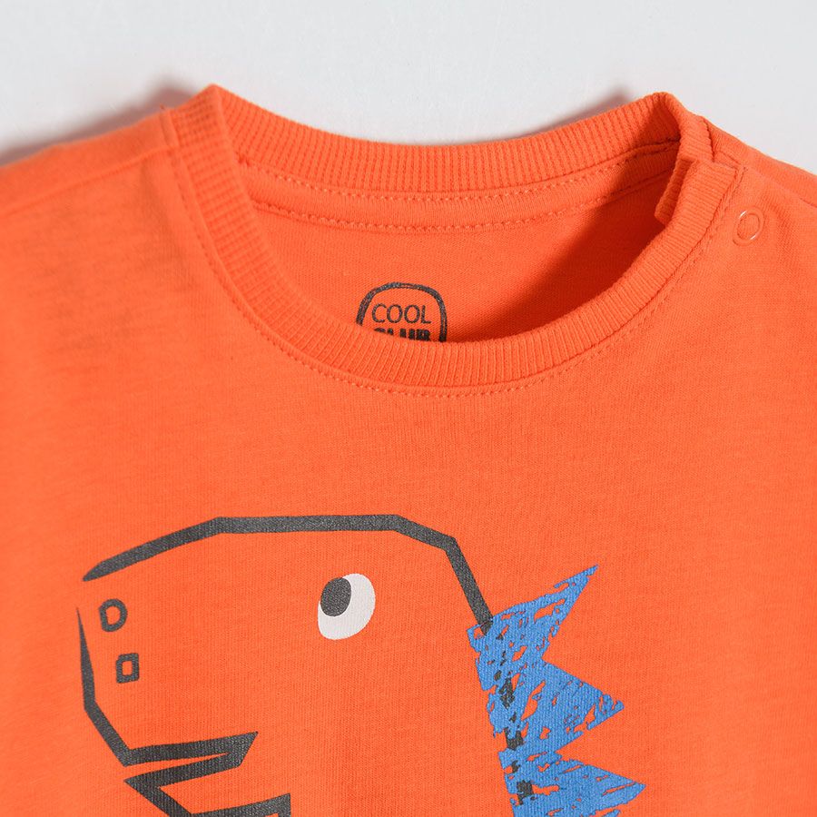 Orange short sleeve T-shirt with dinosaurs print