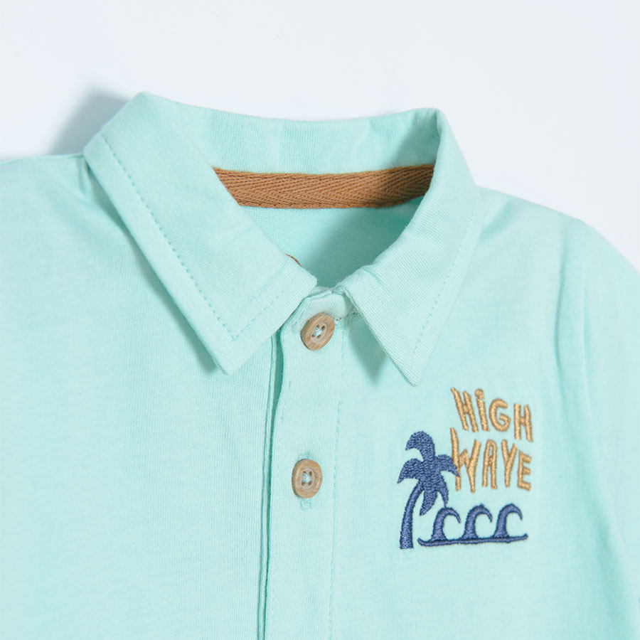 Turquoise polo short sleeve T-shirt with palm tree and SURF print on the back