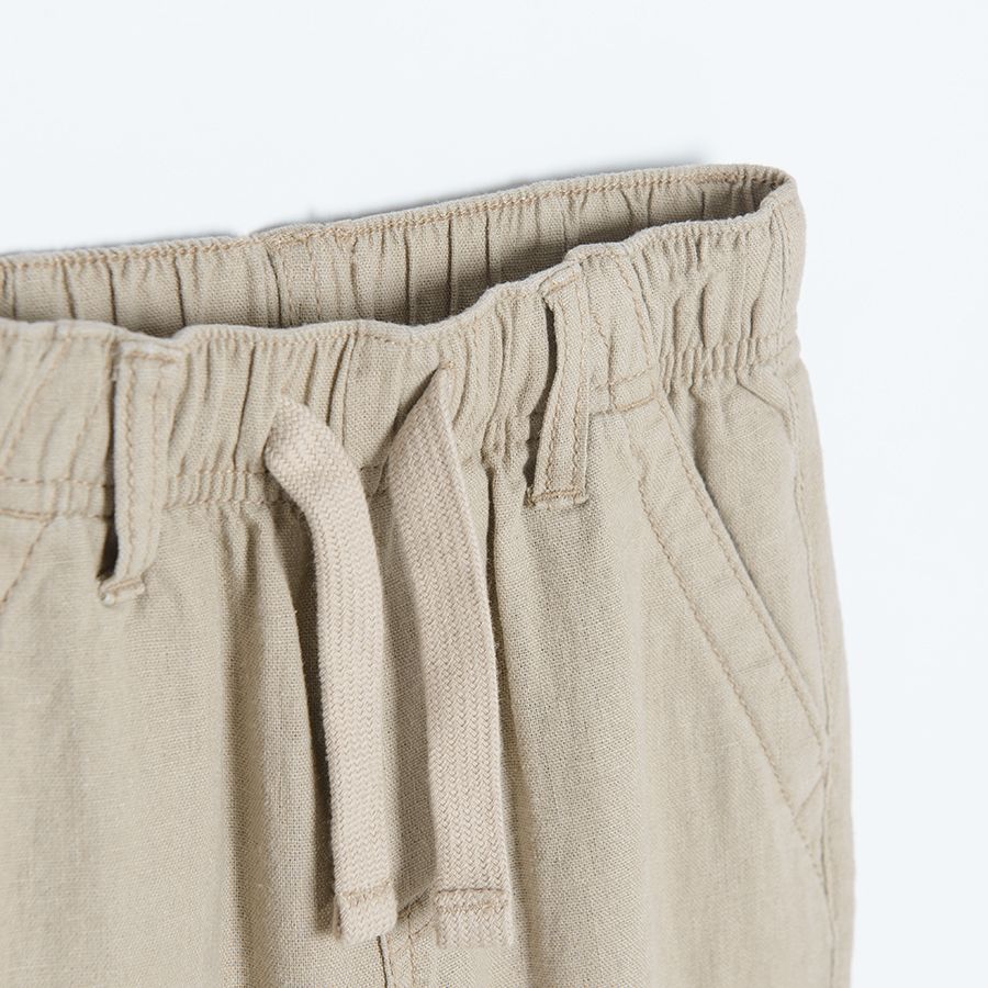 Beige trousers with elastic waistband