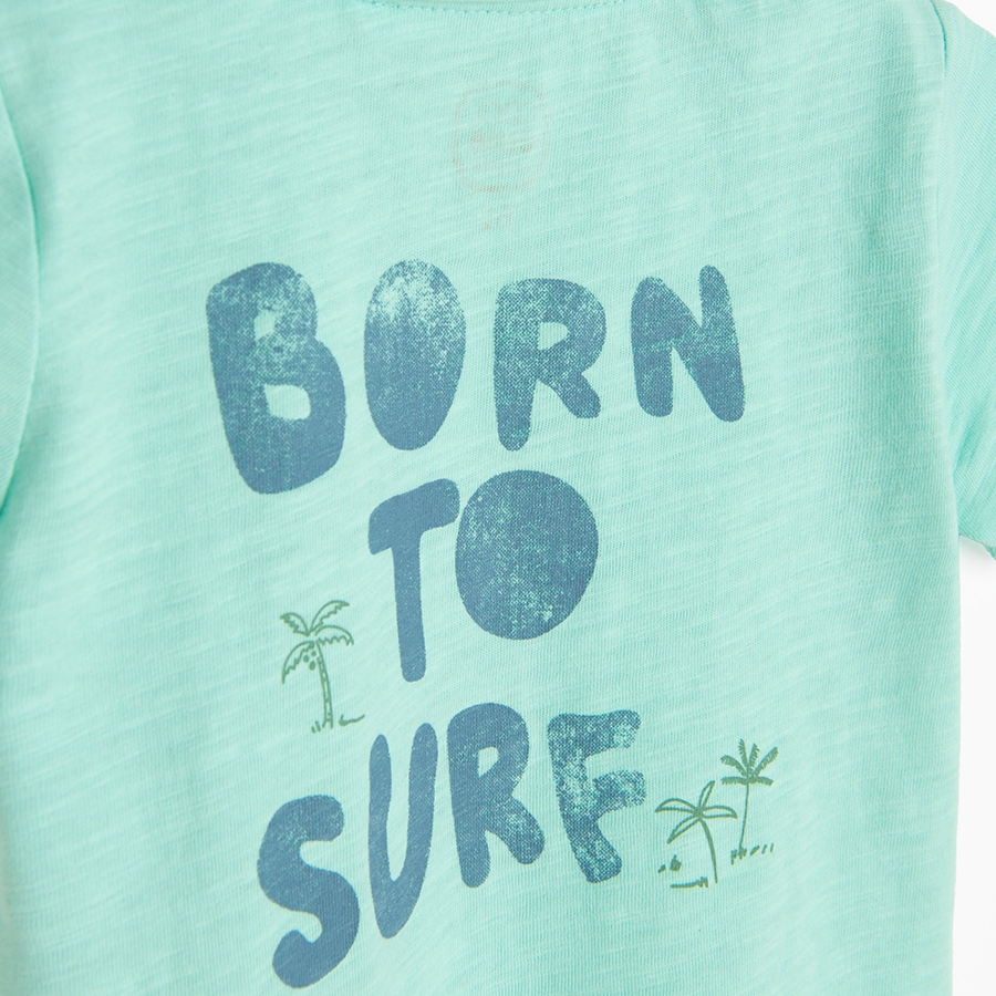 Turquoise polo T-shirt with Born to Surf print on the back