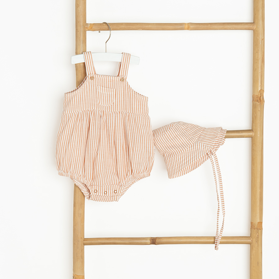 Cream romper with matching summer hat